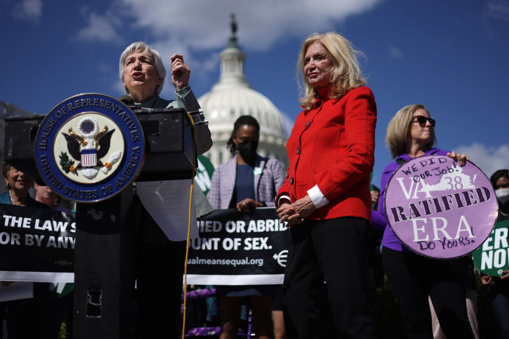 Eleanor Smeal speaks during a news conference near the U.S. Capitol Sept. 28, 2022, while then-Rep. Carolyn Maloney (D-N.Y.) listens