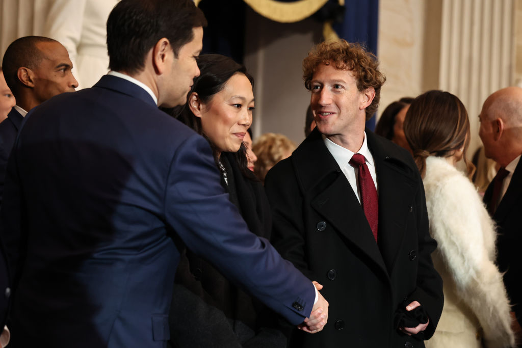 Mark Zuckerberg and his wife Priscilla Chan speak with Secretary of State Marco Rubio at Trump's inauguration